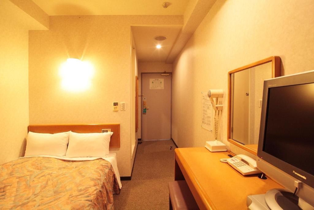 Hotel New Budget Sapporo Cameră foto